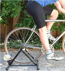 man cycling to make legs longer